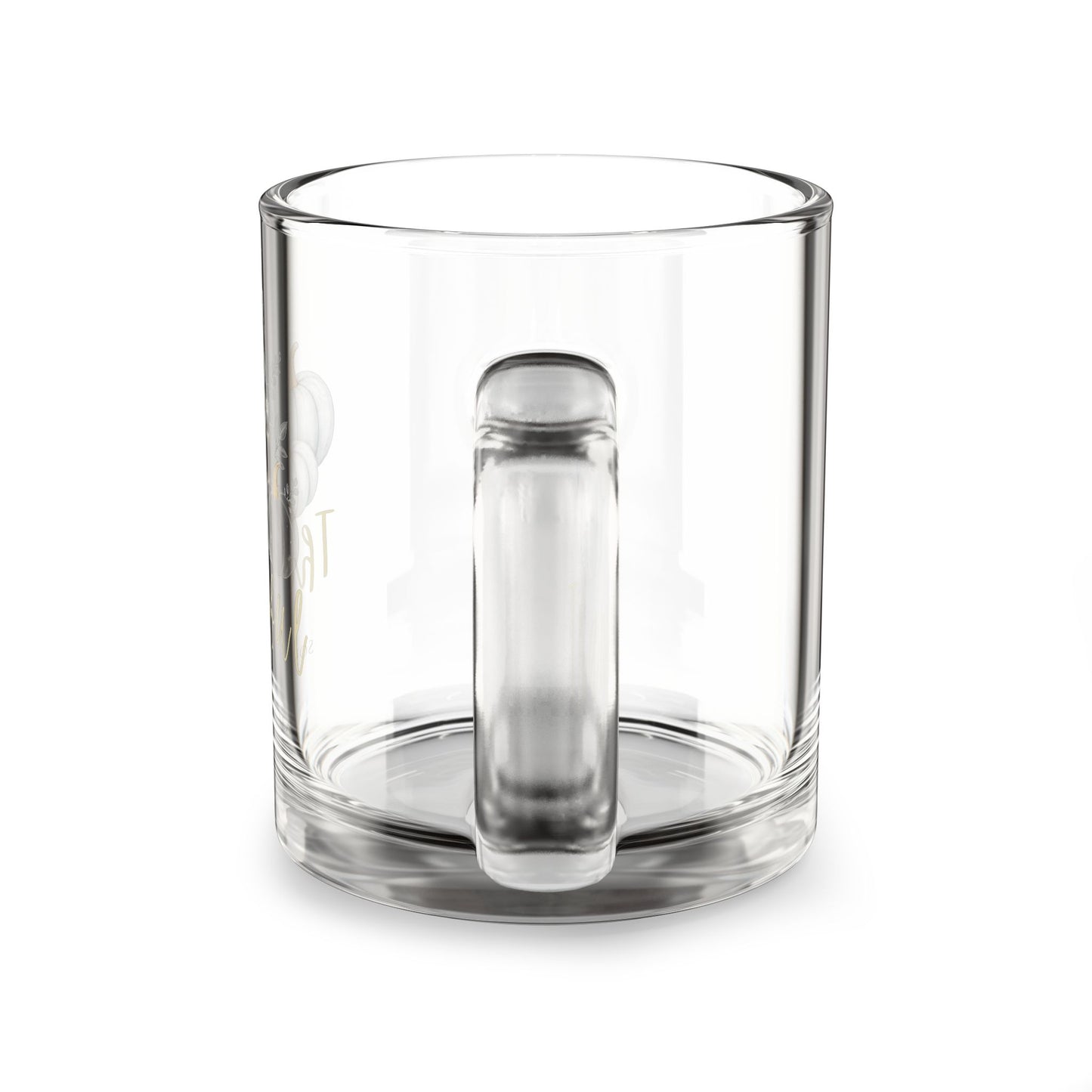 Clear glass mug with a metal tea infuser on a white background