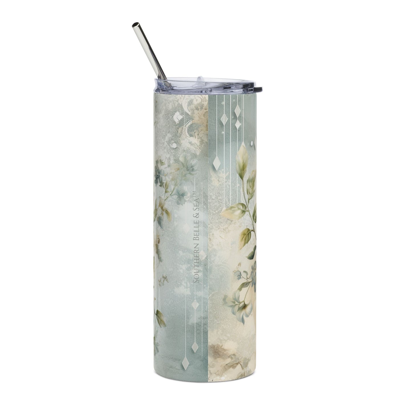 Tumbler with floral design and metal straw on a white background