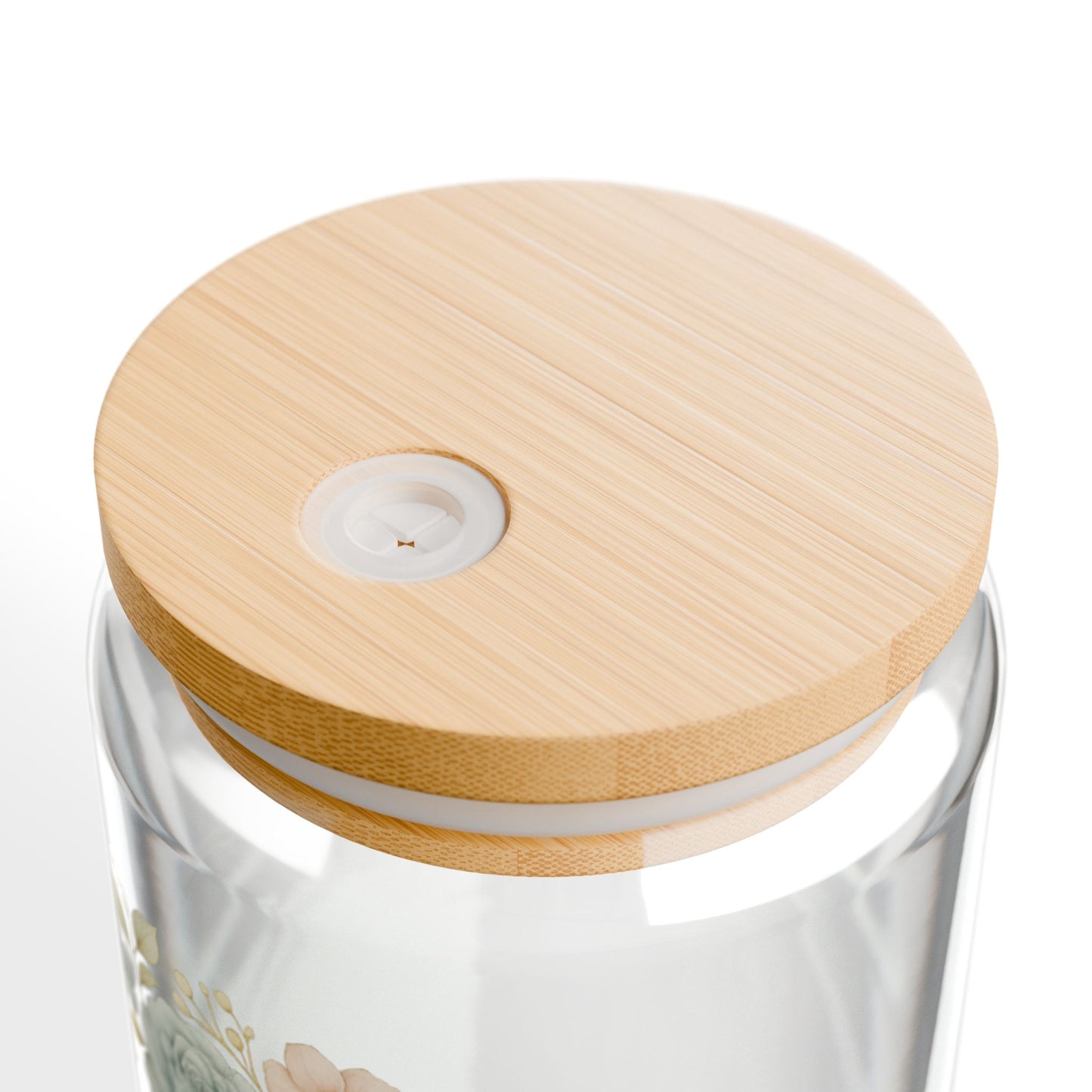 Glass container with a wooden lid on a white background