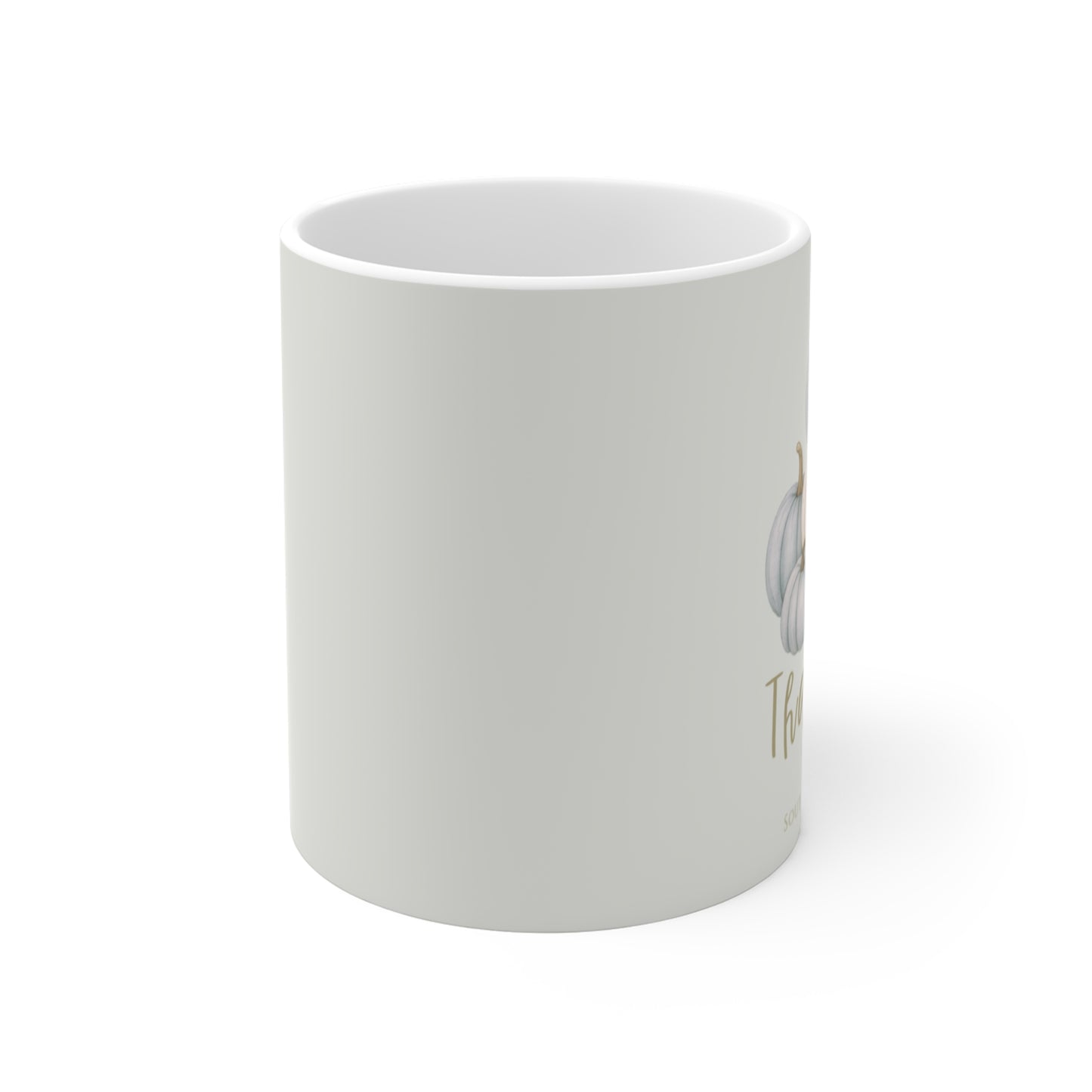 White mug with a printed design on a white background