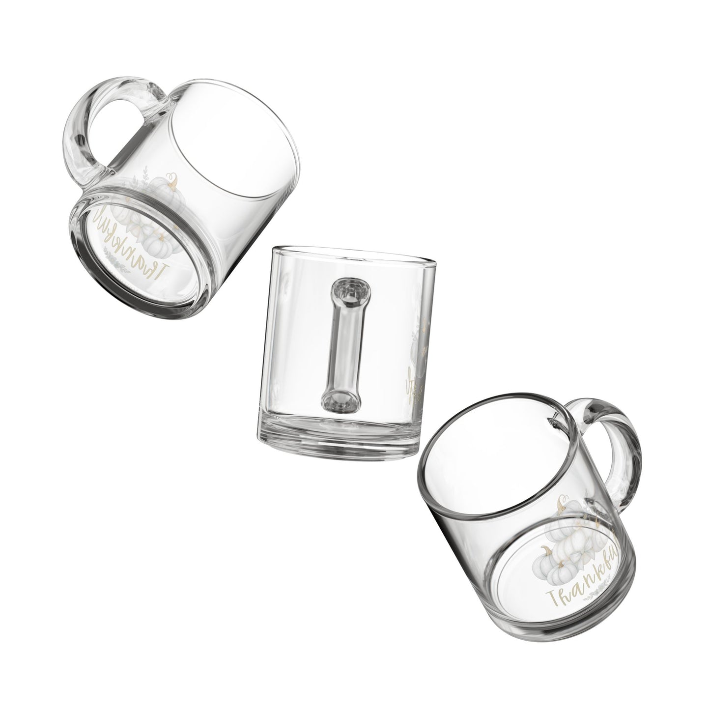 Set of three clear glass mugs with handles on a white background