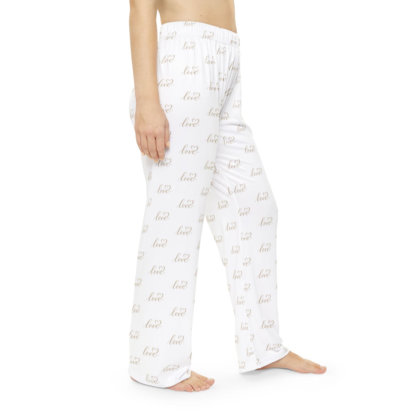 White pajama pants with gold text on a white background