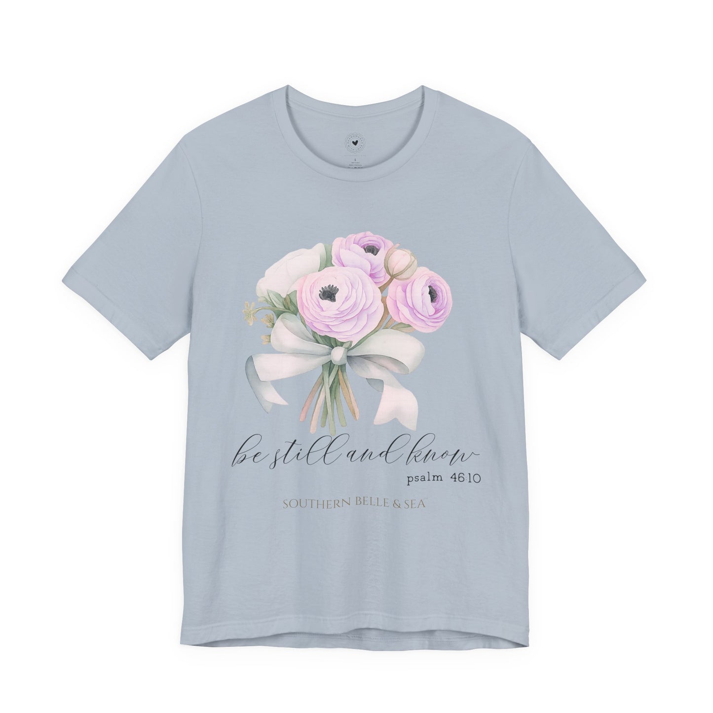 Light blue t-shirt with floral design and text on a white background