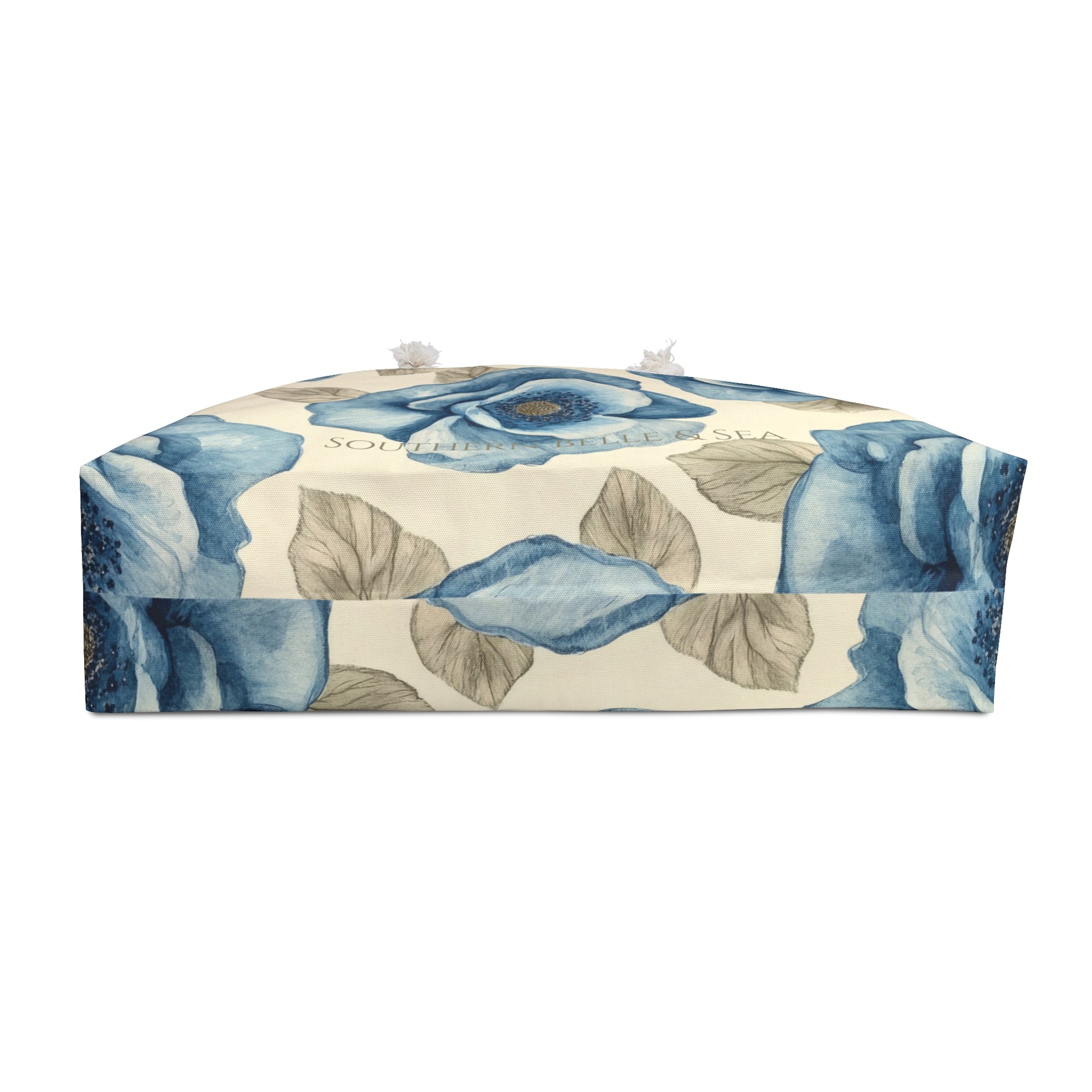 Decorative tissue box cover with blue floral design on a white background