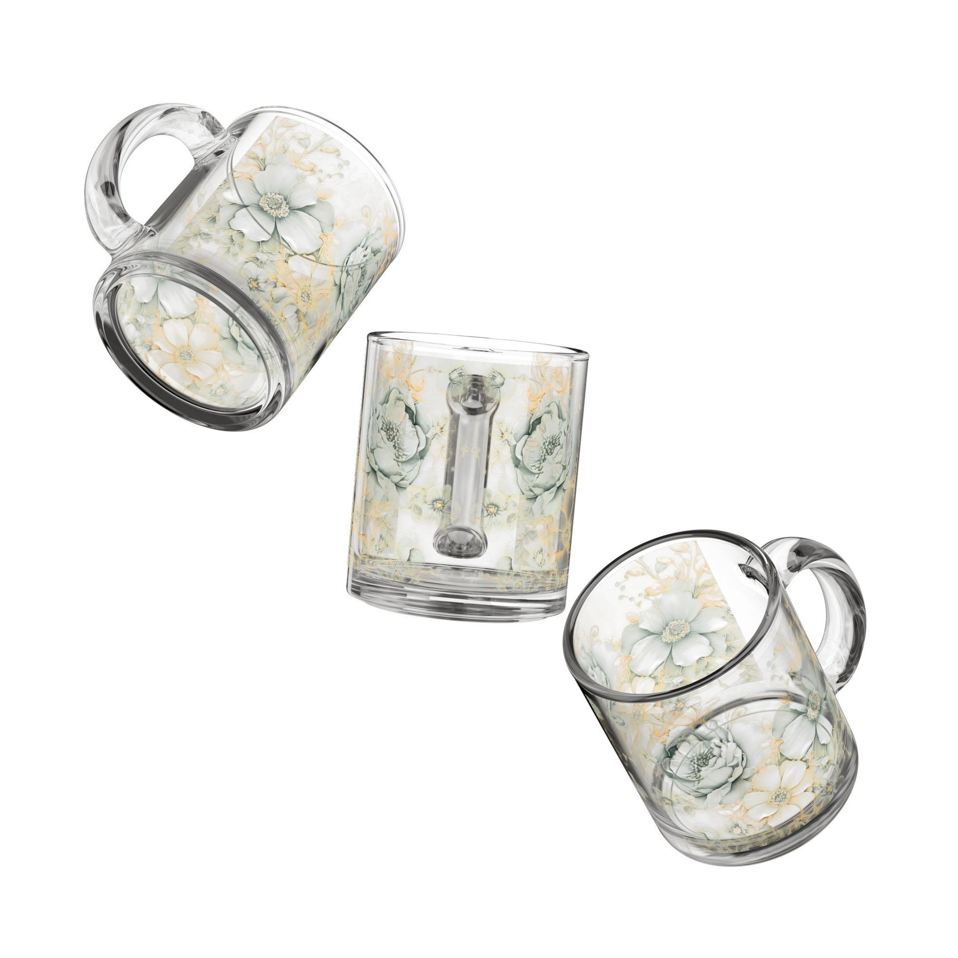 Set of three glass mugs with floral design on a white background