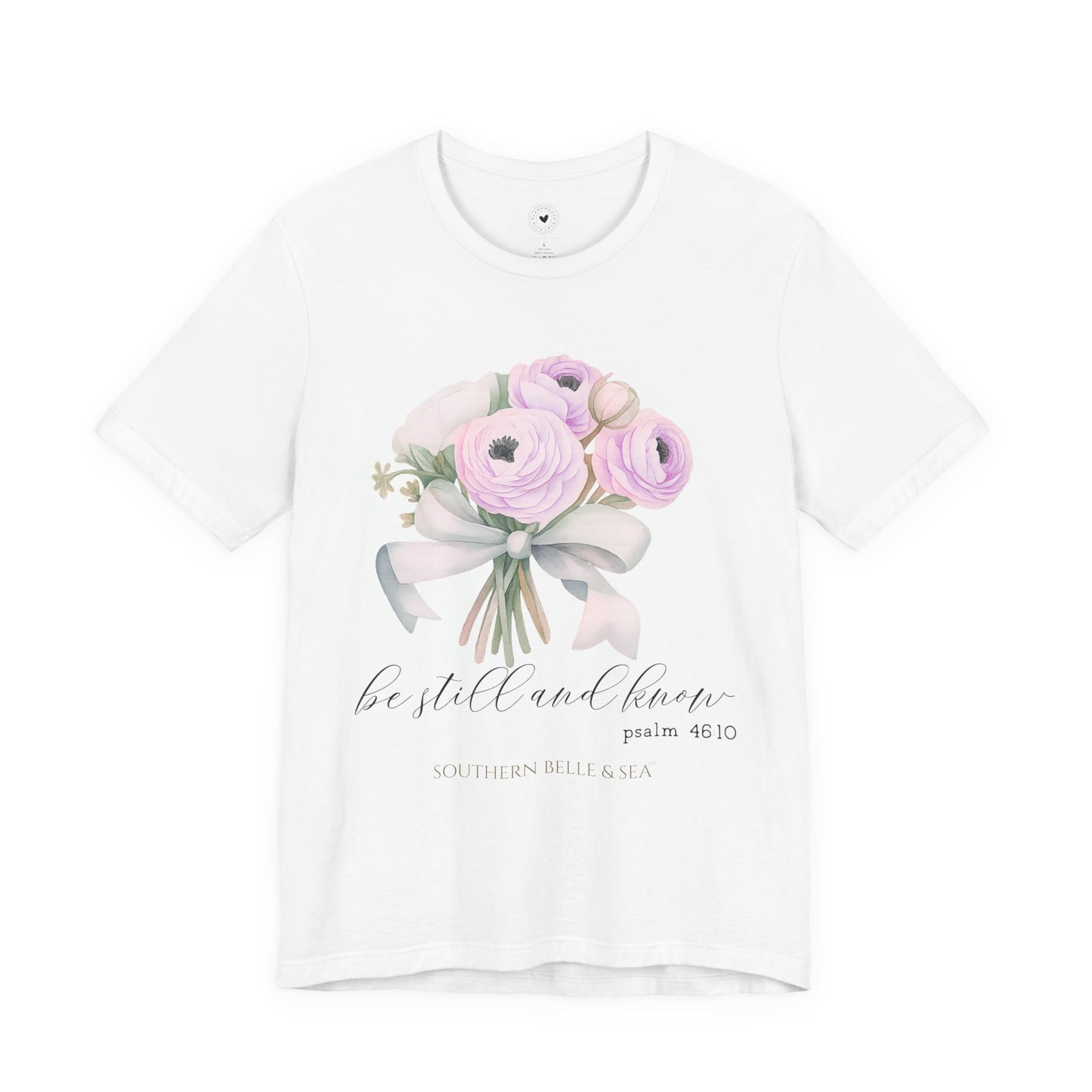 White t-shirt with floral design and text on a white background