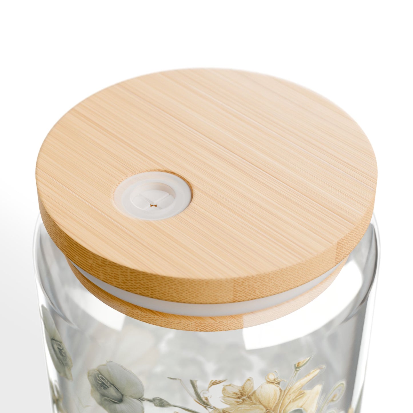 Glass container with floral design and wooden lid on a white background