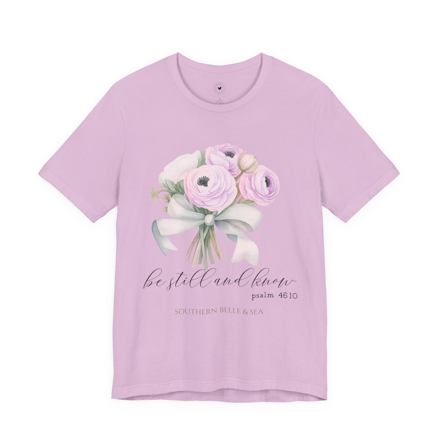 Lavender t-shirt with floral design and text on a white background