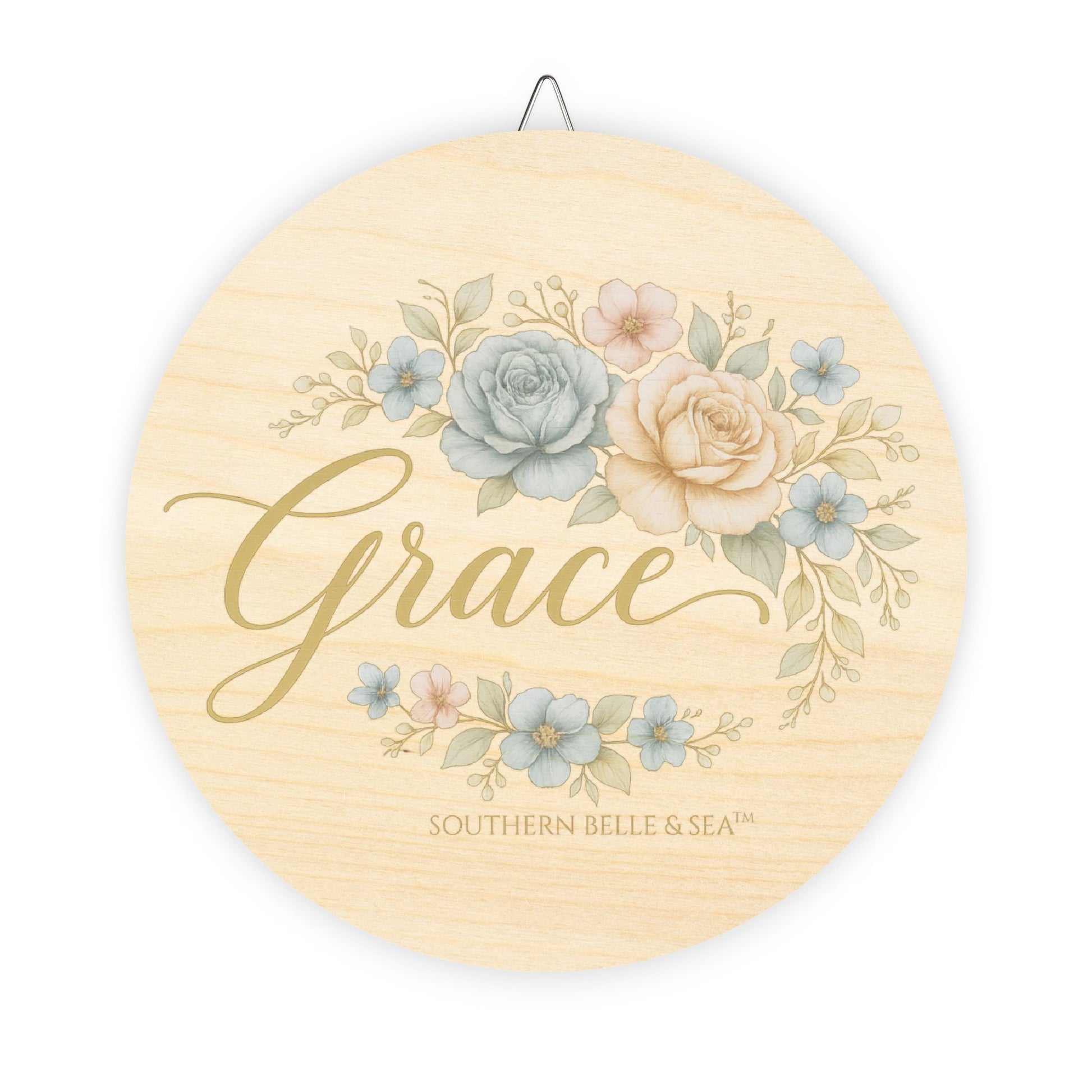 Decorative wall art with floral design and 'Grace' text on a beige background