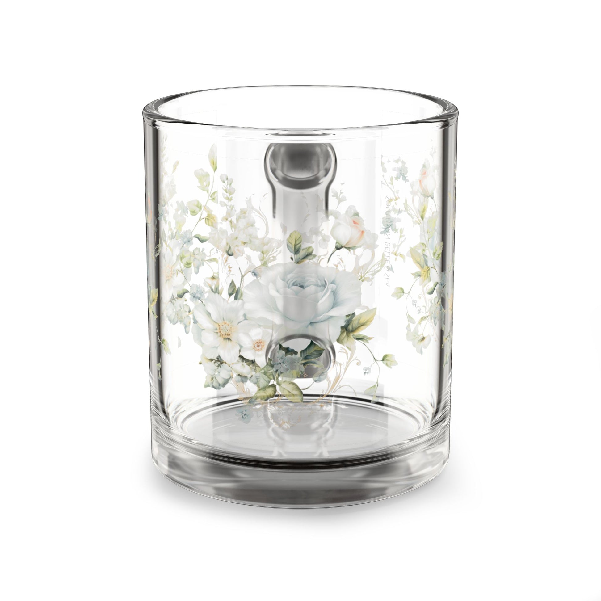 Clear glass coffee mug with floral design on a white background