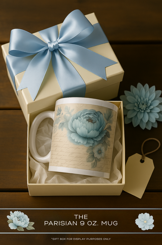 The Parisian 9 oz. Mug in cream gift box with satin blue bow and floral design.