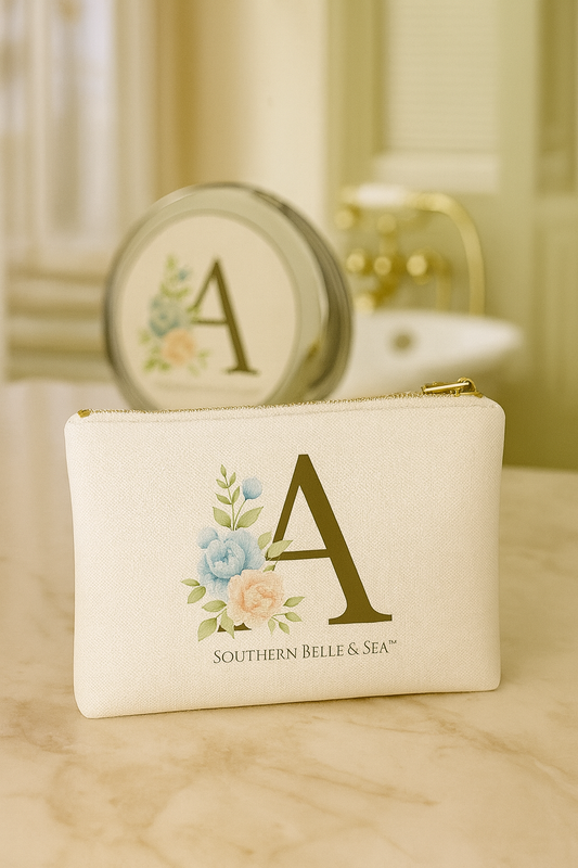 Cream-colored pouch with floral design and 'A' letter, featuring 'Southern Belle & Sea' branding.