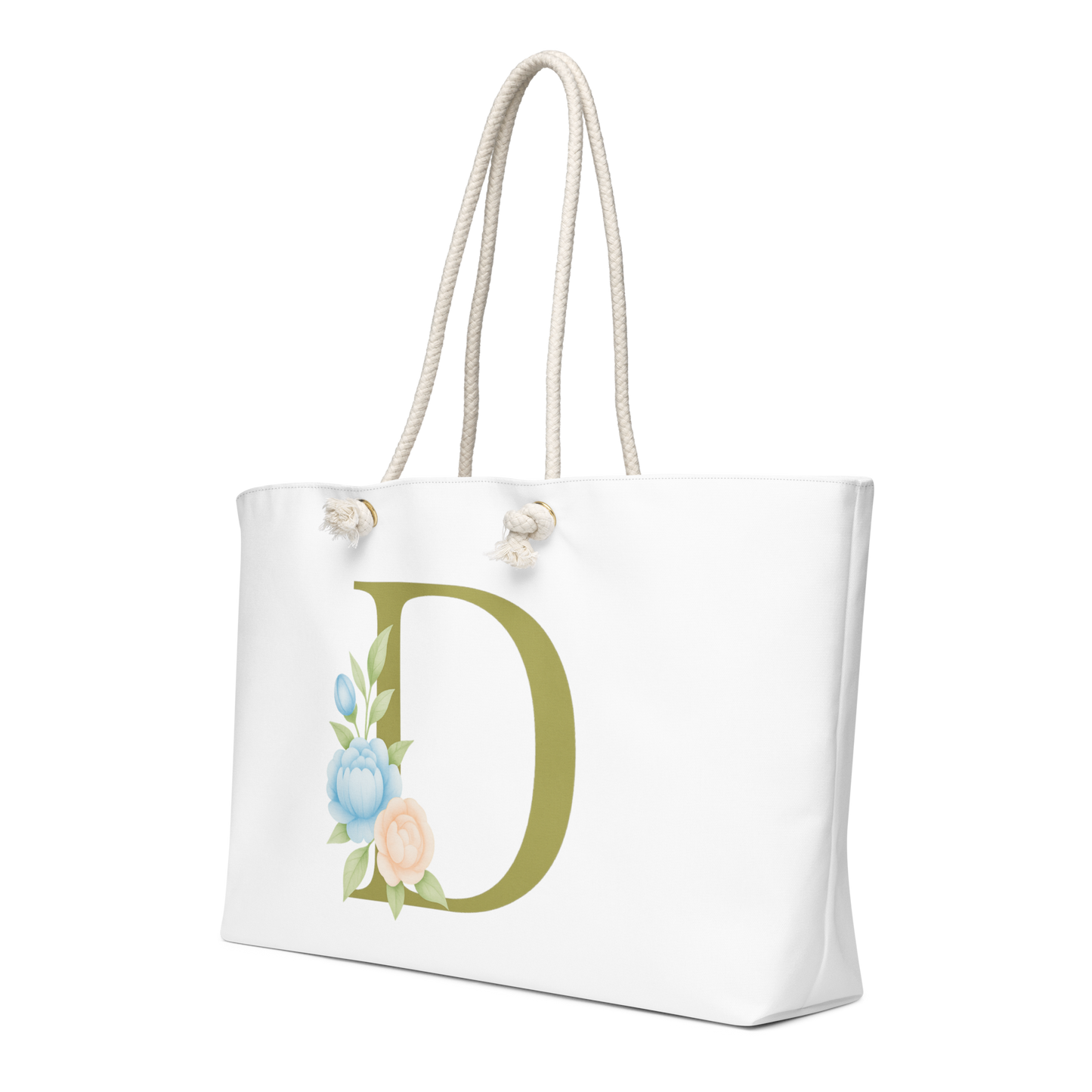 Side Angle Left – White tote bag with large green letter “D” adorned with pastel florals.