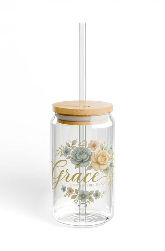 Clear tumbler with floral design and 'grace' text on a white background