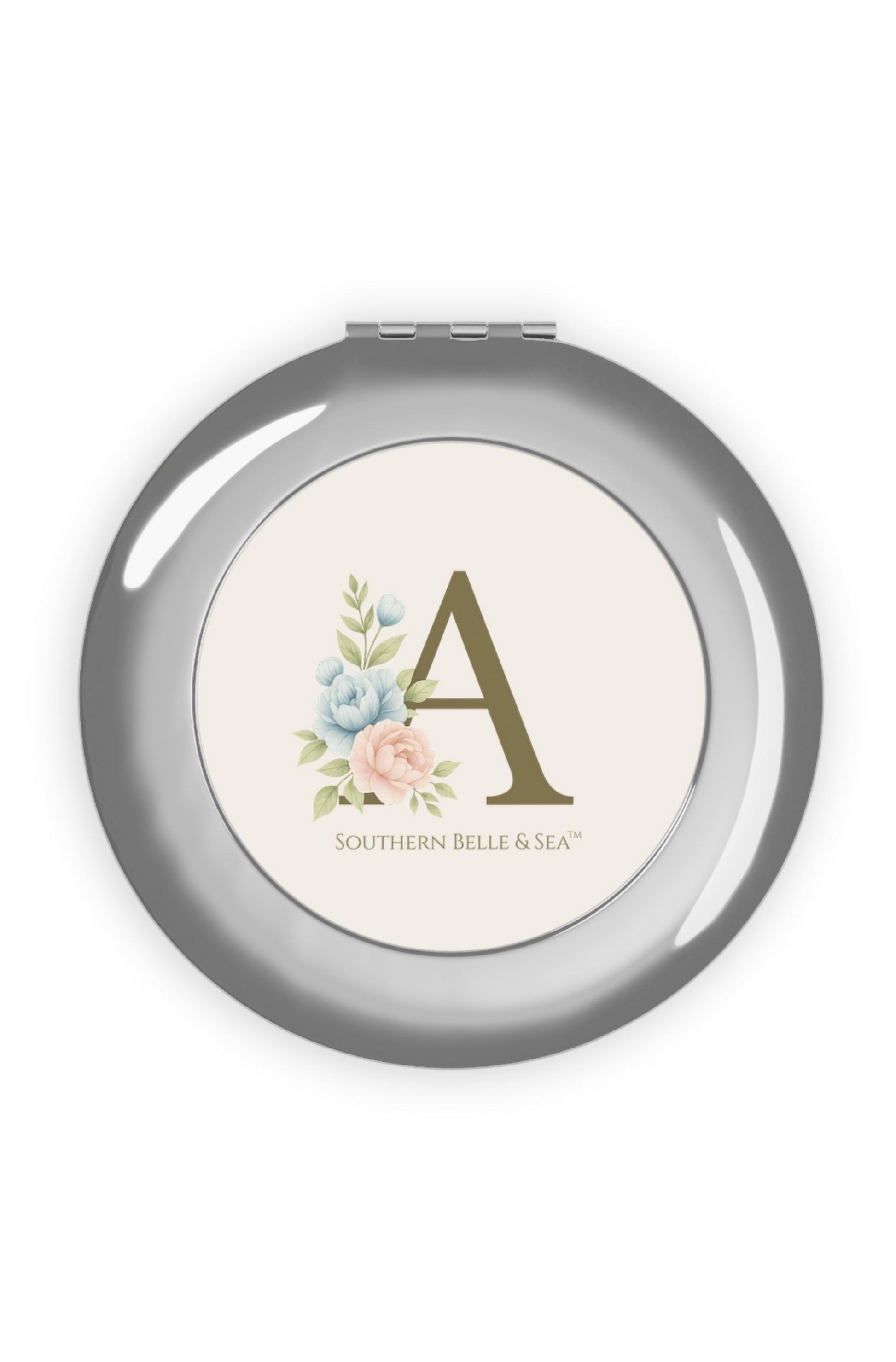 Compact mirror with floral design and letter 'A' on a white background