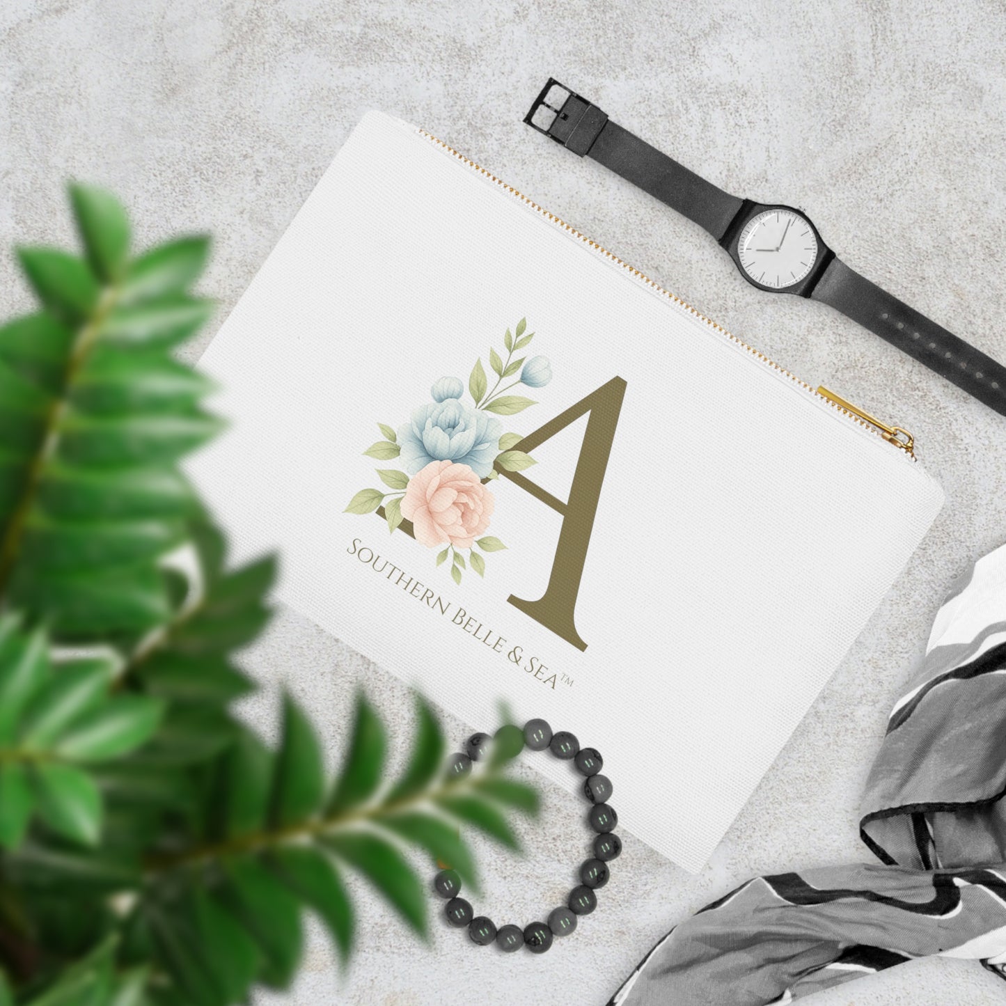 Southern Belle & Sea™ Monogram “A” Cosmetic Bag styled on vanity with makeup and accessories