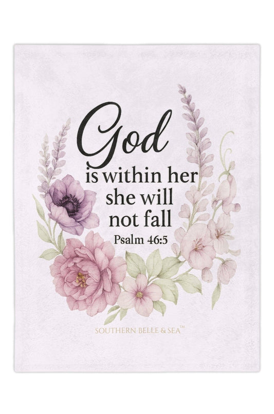 Decorative God is Within her she will not fall. Velveteen blanket with floral design and inspirational quote on a pink background