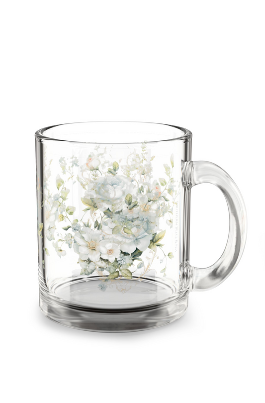 Clear glass mug with floral design on a white background